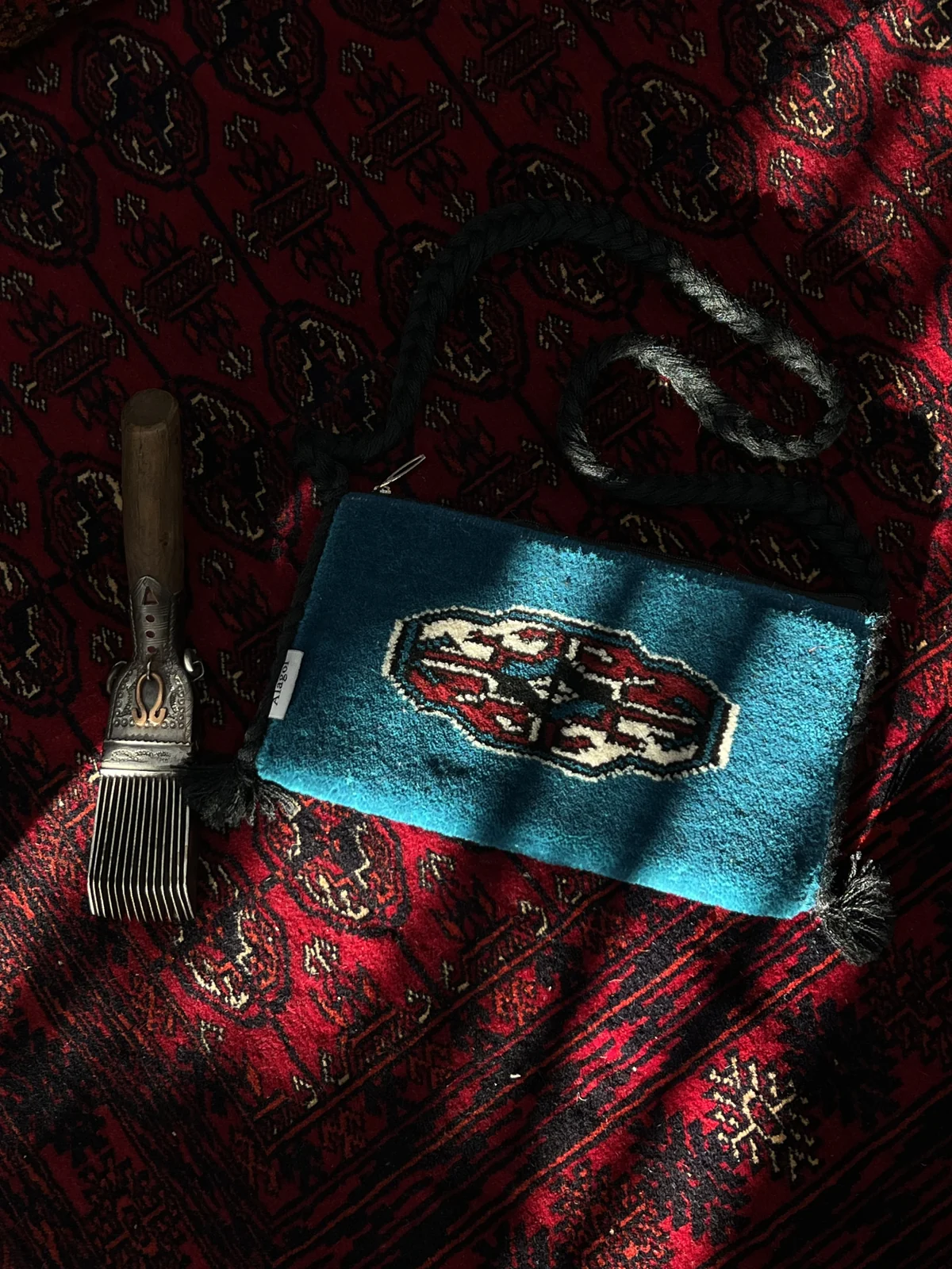 Close-up of the pattern on the blue handwoven bag
